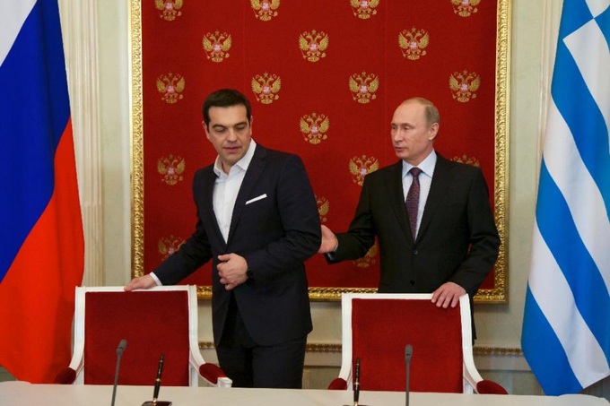 Greek PM blasts Russia sanctions at Putin meet - 1