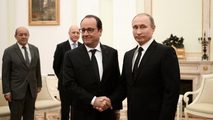 Putin, Hollande agree to coordinate on IS fight but divisions remain - 1