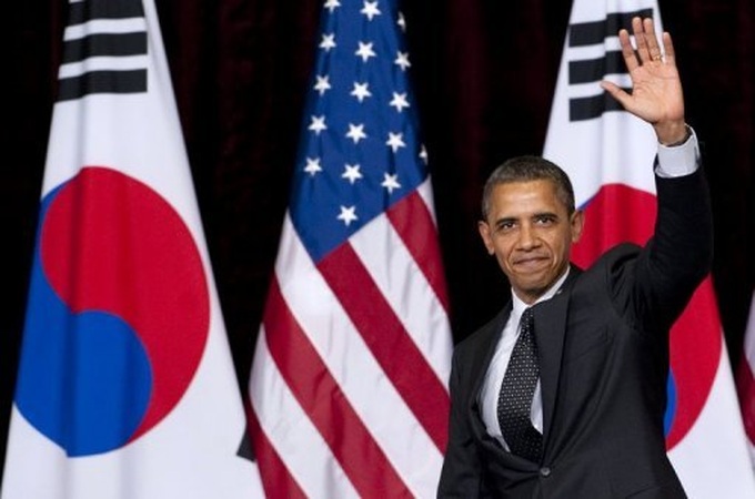 Obama pledges nuclear cuts, warns N. Korea and Iran - 1