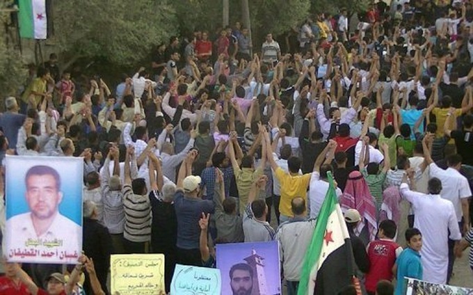 More than 70 killed in Syria ahead of Annan return - 1