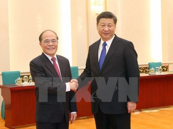 Vietnam’s top legislator meets with Chinese Party chief - 1
