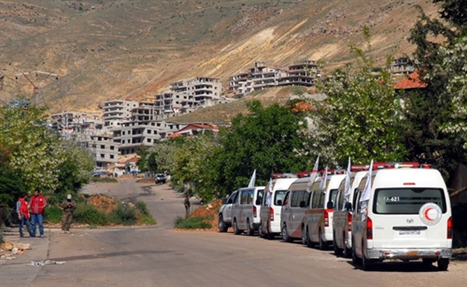 UN begins major evacuation in Syria as peace talks fray - 1