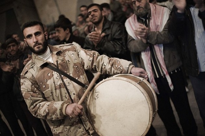 Syria 'yes' for new charter as over 100 reportedly killed - 1