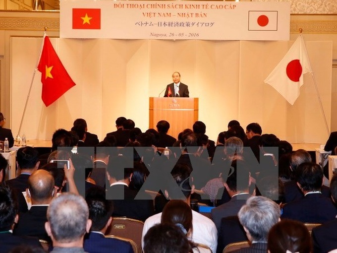 PM attends Vietnam-Japan economic policy dialogue - 1