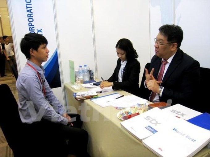 Weak English skills hinder local employees - 1