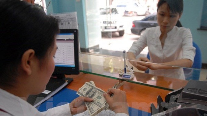 International organisations laud SBV exchange rate adjustment - 1