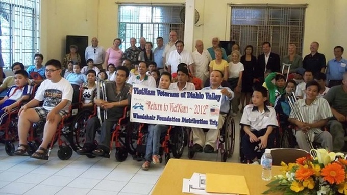 320 wheelchairs presented to disabled people - 1 320 wheelchairs presented to disabled people - 1