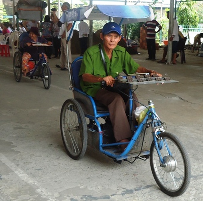 Disabled in HCM City empowered by electric wheelchairs - 1