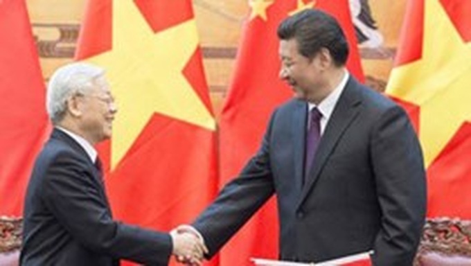 Officials talk promising developments in Vietnam-China relations - 1