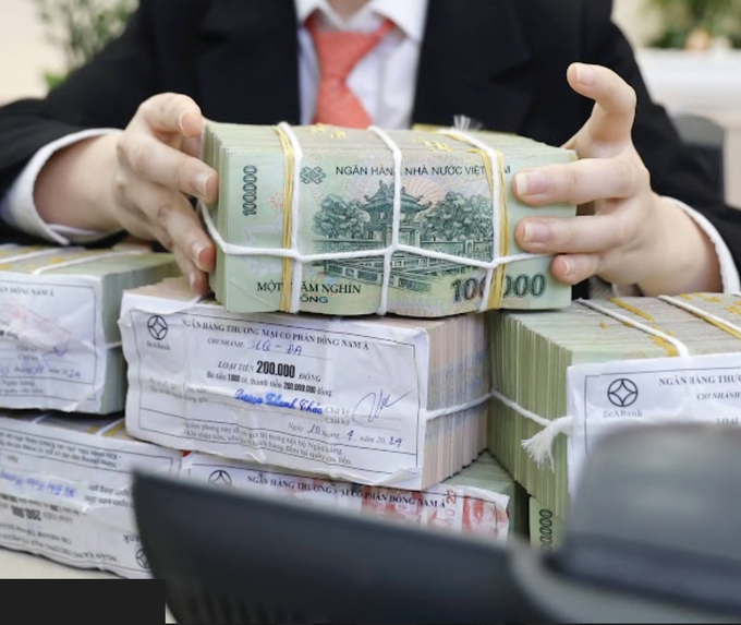 Vietnamese banks pledge to cut lending rates by up to 2 per cent - 2
