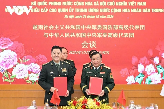 Vietnam and China sign defense cooperation document - 1 Vietnam and China sign defense cooperation document - 1