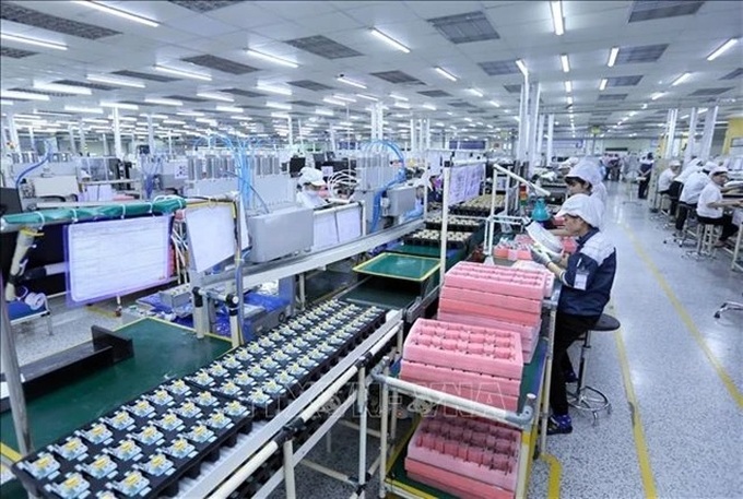 Vietnamese businesses slow to take part in global supply chain - 1