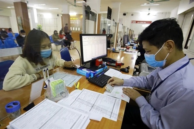 Vietnam’s low-skilled workers hesitate to retrain - 1