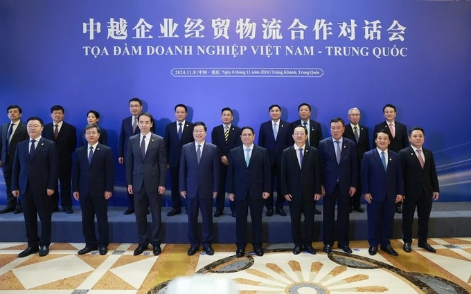 PM calls on Vietnamese, Chinese firms to enhance partnerships - 1