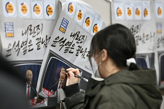 South Korea slaps travel bans on more top officials - 1