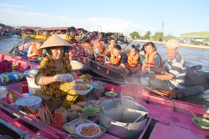 First-ever spring flower market to be held on Cai Rang floating market - 1