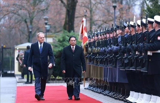 Welcome ceremony held for Vietnamese PM in Warsaw - 1