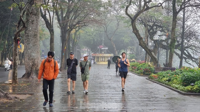 A dreamy Hanoi in drizzling rain and mist - 1