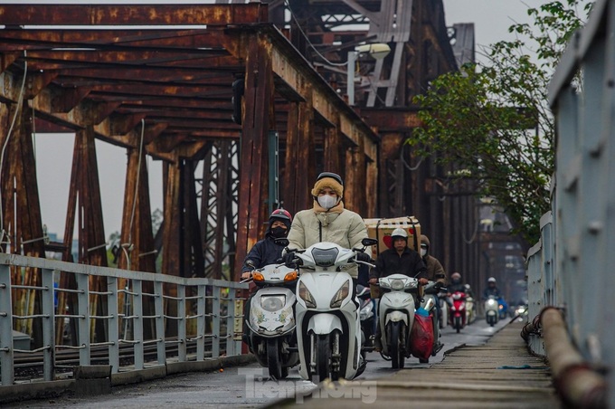 A dreamy Hanoi in drizzling rain and mist - 10