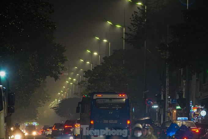 A dreamy Hanoi in drizzling rain and mist - 17