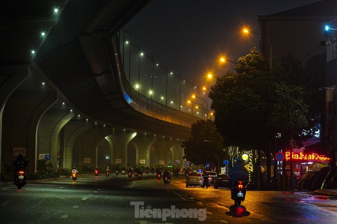 A dreamy Hanoi in drizzling rain and mist - 16