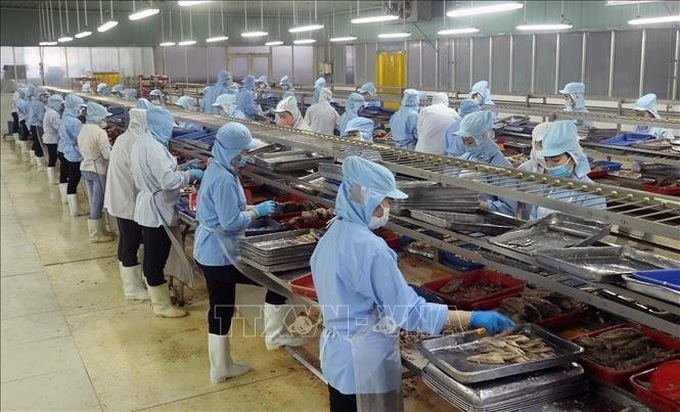 US cuts tariff to 20 per cent on Vietnam, investment unaffected: expert - 1 US cuts tariff to 20 per cent on Vietnam, investment unaffected: expert - 1