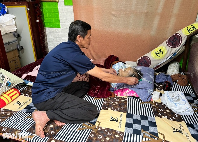 Husband exhausted caring for comatose wife in Dalat - 1