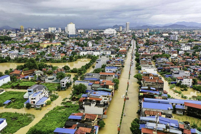 Thousands evacuated as Storm Matmo triggers record floods in Thai Nguyen - 3