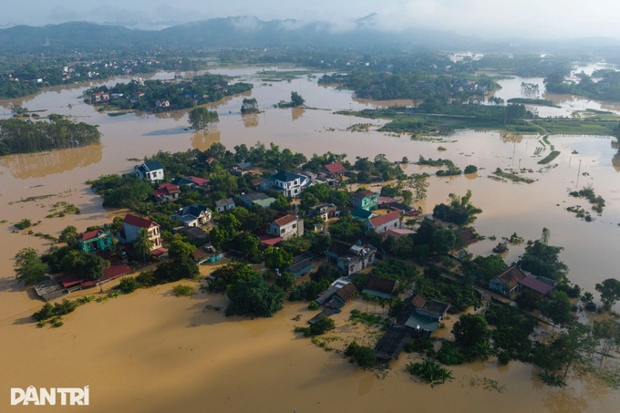Rising Cau River water isolates over 1,200 households in Hanoi - 2 Rising Cau River water isolates over 1,200 households in Hanoi - 2