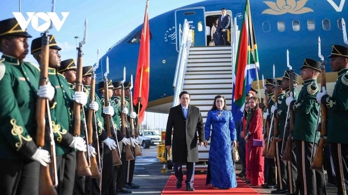 Prime Minister Pham Minh Chinh arrives in South Africa for G20 Summit - 1
