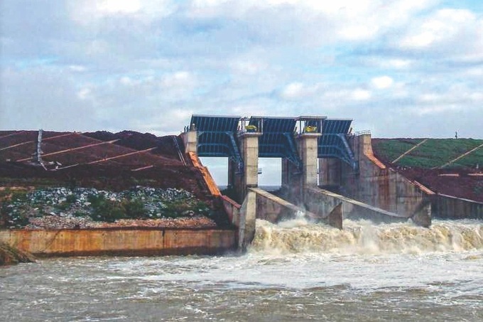 Three HCM City reservoirs release floodwater as storm increases risks - 1
