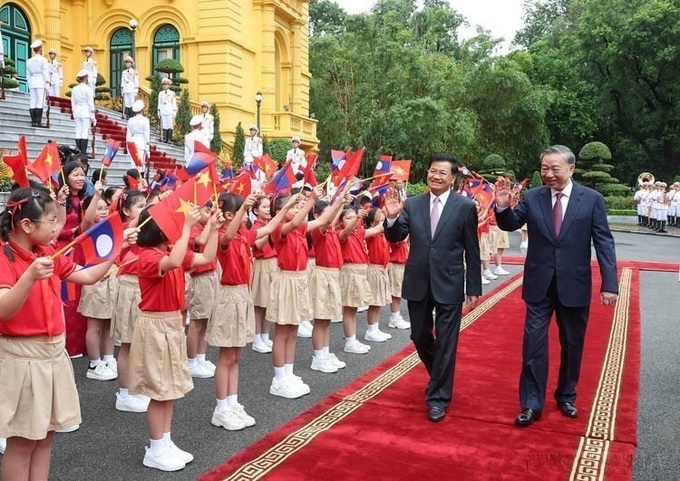 Top Lao leader to pay state visit to Vietnam - 1