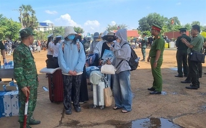 Vietnam receives 59 citizens repatriated from Cambodia - 1