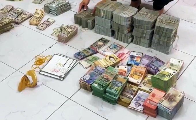 HCM City court sentences 19 in major cross-border money laundering ring - 1