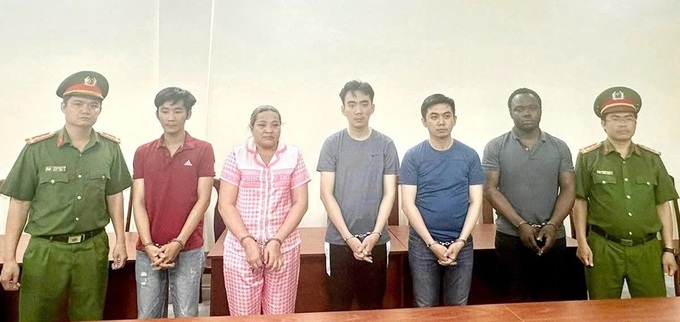 HCM City court sentences 19 in major cross-border money laundering ring - 2