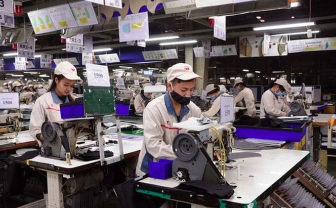 Vietnam PMI eases to 51.2 as prices surge - 1