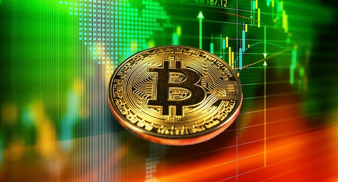 Bitcoin tăng mạnh, vượt 66.000 USD - 1