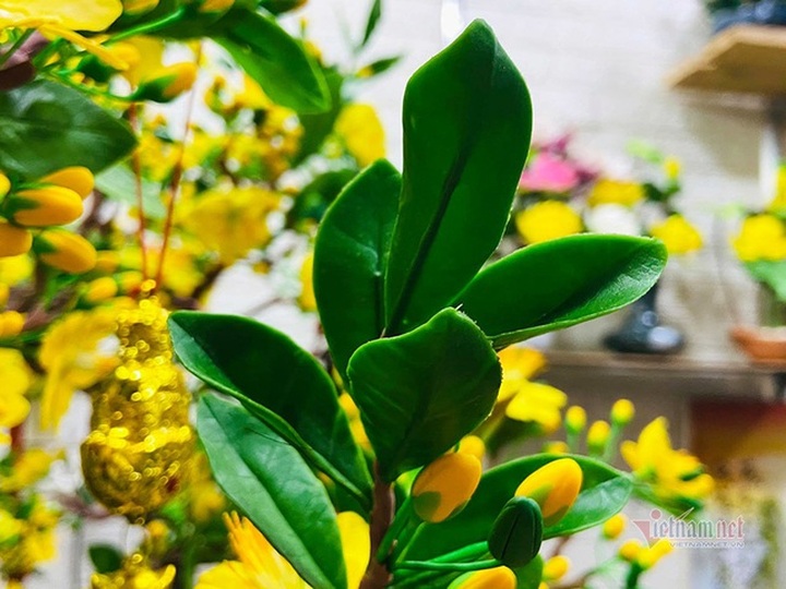 Bà chủ Sài Gòn dùng 35 kg đất sét làm cây mai cao 2 m chơi Tết - 7