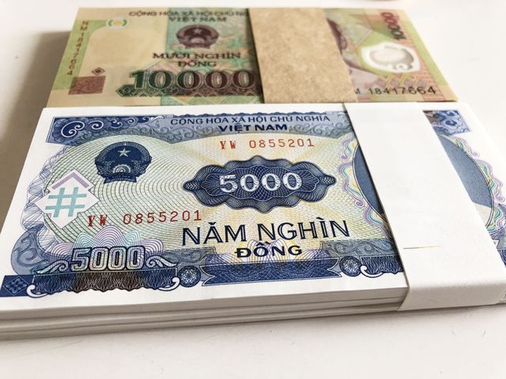 Càng cận Tết, phí đổi tiền mới càng tăng, có nơi đòi 70% - 1