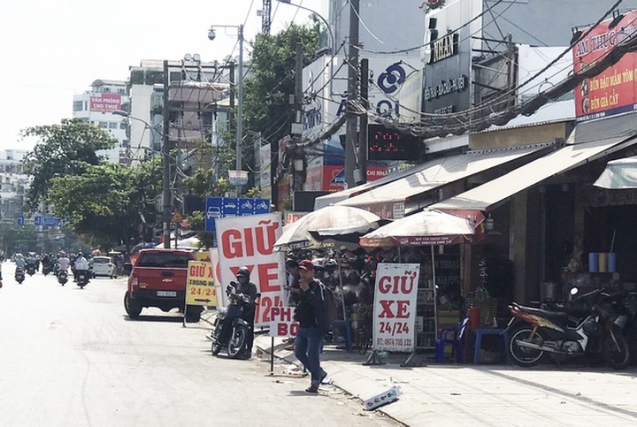 Lập lờ giá giữ xe Tết, người dân ngậm trái đắng - 3