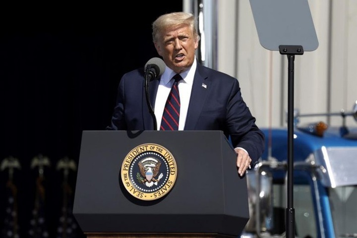 Ông Trump dọa trừng phạt doanh nghiệp Mỹ không đưa việc làm về nước - 1