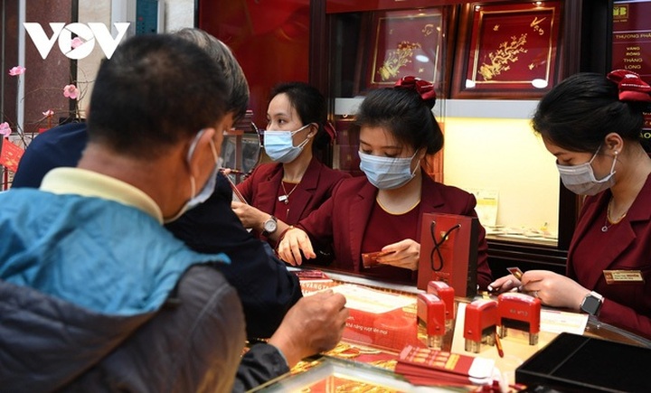 Sau dịch Covid-19, nên mua đất hay mua vàng? - 1