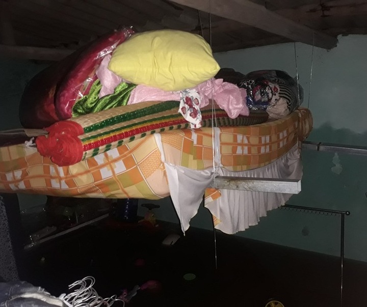 Hundreds of households evacuated as flood rose in Binh Dinh - 6