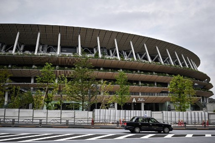 Japan athletes give Tokyo Olympic stadium a test run - 1