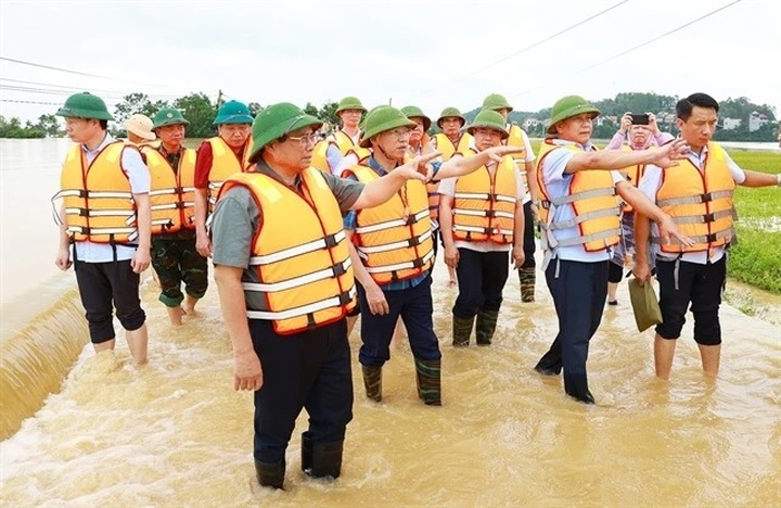 PM calls for swift action in flood-hit Bac Giang province - 1