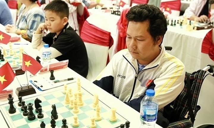 Vietnamese player beat former world champion in Chess Olympiad for people with disabilities - 1
