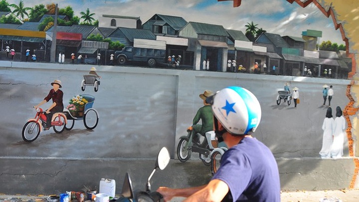 Mural project brightens Can Tho street - 5 Mural project brightens Can Tho street - 5