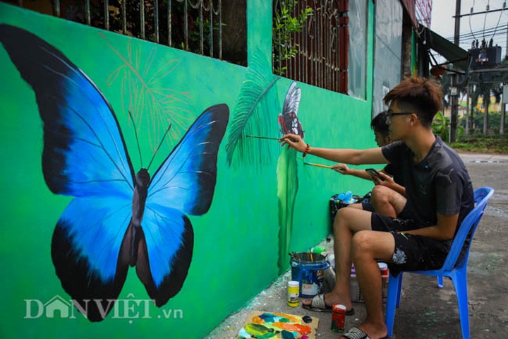 Mural project brightens Hanoi suburban village - 5