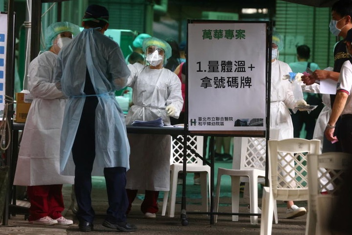 Singapore shuts schools, Taiwan bars foreigners to battle outbreaks - 1