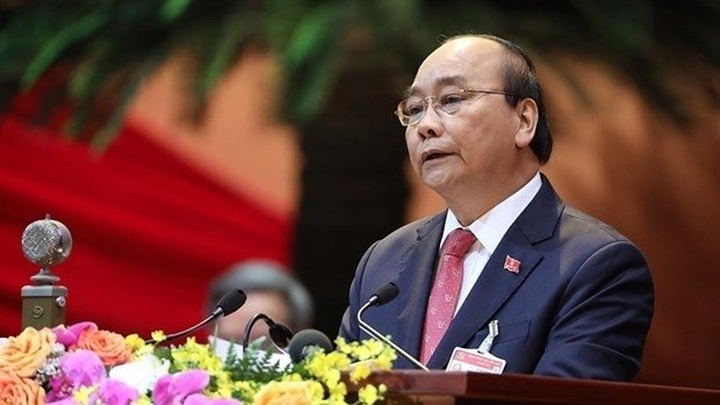 PM Nguyen Xuan Phuc delivers opening speech at the 13th National Party Congress - 1